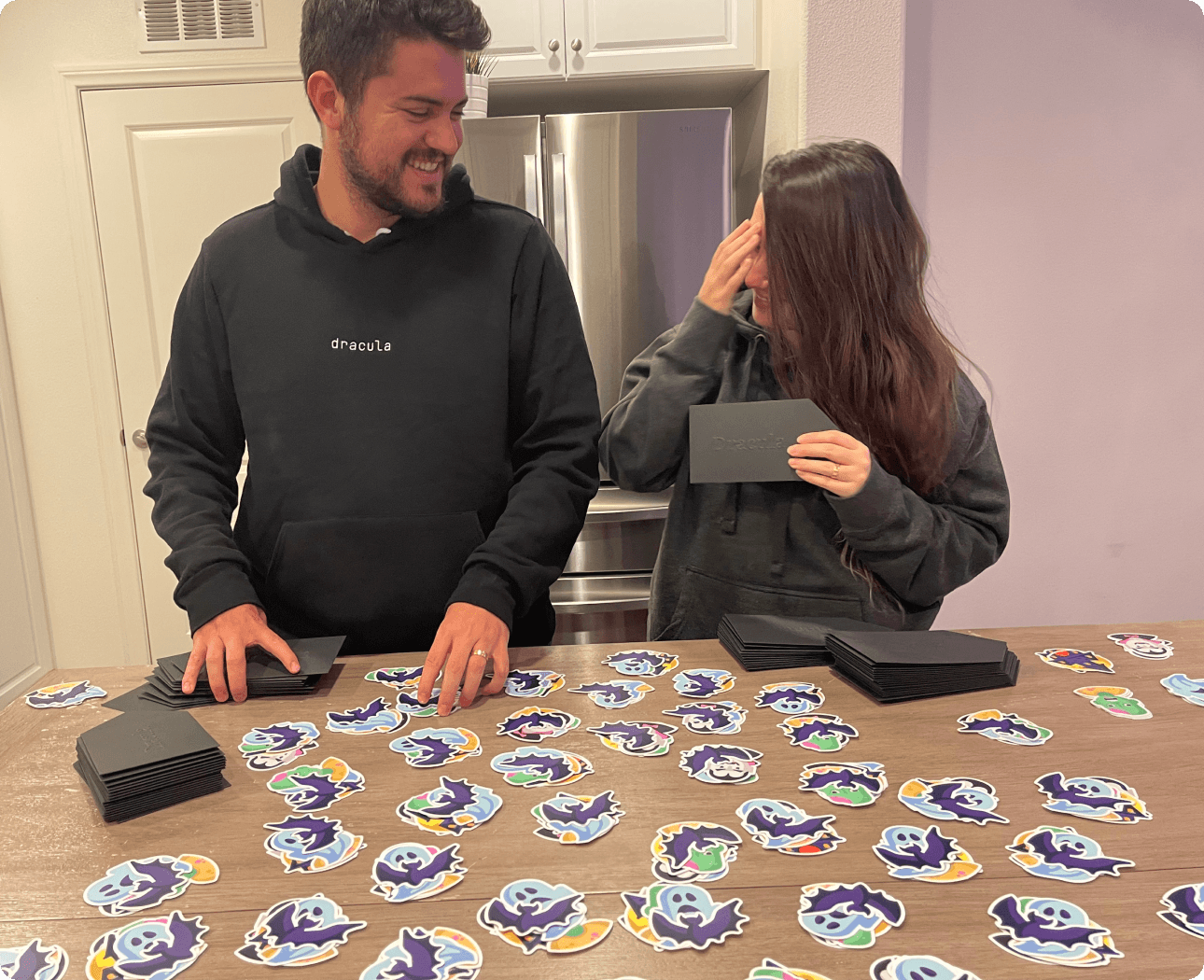 Zeno Rocha and his wife prepared the stickers for shipping